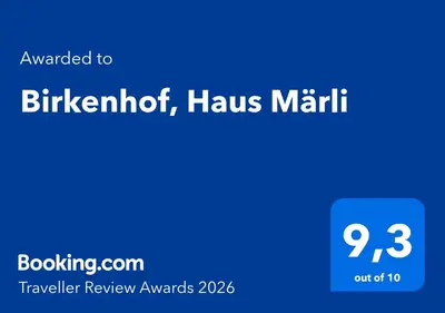 a screenshot of a phone with the text upgraded to birmingham hakus maritt at Birkenhof, Haus Märli in Herisau