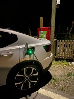 a white car with a green light on the back at Gästehaus Eisenhut in Walzenhausen