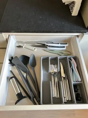a drawer filled with utensils in a kitchen at Jasminkas Host 1, Ruhig, Gratis Parkplatz Balkon & im 1, Stockwerk in St. Gallen