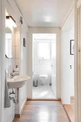 a bathroom with a sink and a toilet at Schöne Wohnung im Herzen von Herisau bis 6 Gäste in Herisau