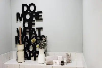 a white counter with vases and other items on it at Kaffeegasse 11 - Holiday home with heart on Lake Constance in Altnau