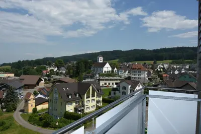 a view of a town from the balcony of a building at Towerhotel in Waldkirch