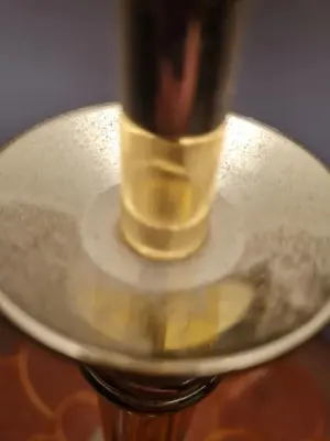 a glass of wine sitting on top of a table at Herberge Seeperle Bistro Rorschach in Rorschach