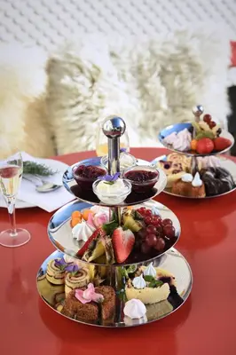 a table with three plates of food on a table at Hotel und Restaurant Wolfensberg in Degersheim