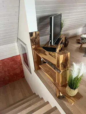 a balcony with a view of a house at Apartment with charm and dream view in Hosenruck