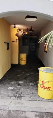 an empty garage with two large barrels in it at Hostel I Love Sg in St. Gallen