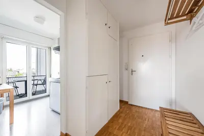a room with white walls and a white closet at SOHO3A !Gratis Parken, Free Parking! in Kreuzlingen