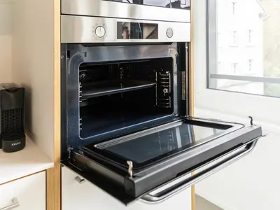 a microwave oven with its door open in a kitchen at Stilvoll & zentral in St Gallen -WYBA Living Rio in St. Gallen