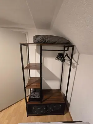 a shelf in a room with a pillow on it at Central studio apartment stgallen gratis Parkplatz in St. Gallen