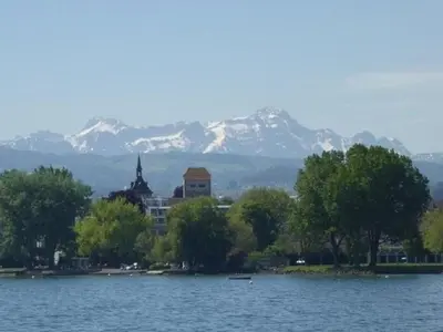 a view of a lake with mountains in the background at Holiday Home Gartenbungalow 2 - 3 Personen by Interhome in Arbon