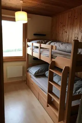 a bedroom with bunk beds in a cabin at Holiday Home Soldanella by Interhome in Appenzell