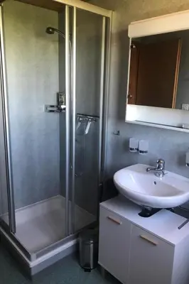 a bathroom with a shower and a sink at Holiday Home Soldanella by Interhome in Appenzell