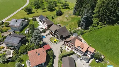 an overhead view of a house with solar roofs at Naturnah und familienfreundlich in Degersheim