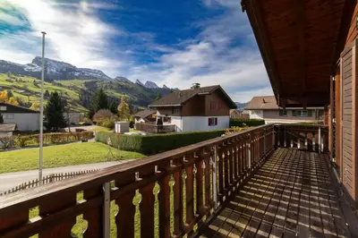 a balcony with a view of the mountains at Sonnegge in Wildhaus