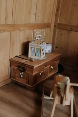 a small table with a machine on top of it at Zimmer Fählensee im Appenzeller Ferienhaus in Brülisau