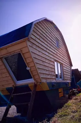 a house with a roof on top of it at Holiday Home Tiny Hause by Interhome in St. Gallen