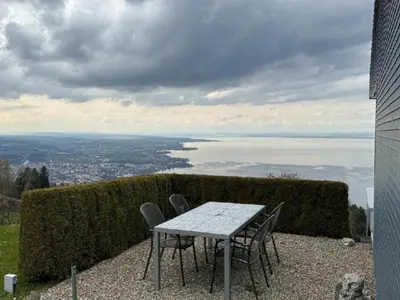 a table and chairs sitting on top of a building at Holiday Home Unterbilchen by Interhome in Eggersriet