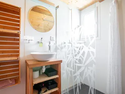 a bathroom with a sink and a shower at Apartment Hof Bommes by Interhome in Gais