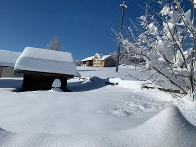 a snow covered house with a pile of snow at Apartment nirkwerk by Interhome in Schönengrund