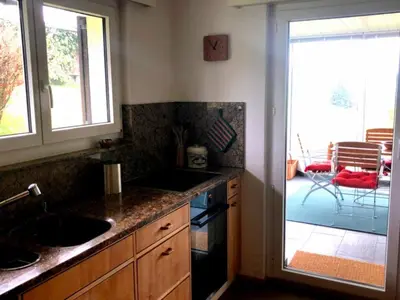 a kitchen with a sink and a stove at Holiday Home See in Sicht by Interhome in Wolfhalden