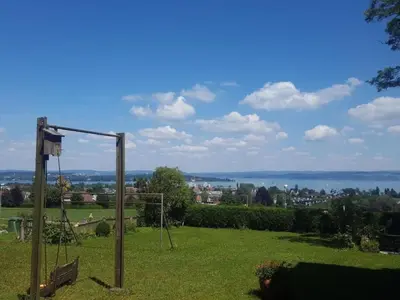 a basketball hoop in a field with a view of a city at Apartment Studio Ferienwohnung - 38 m2- mit Gartennutzung by Interhome in Bottighofen