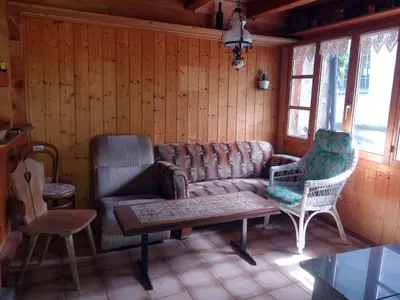 a living room with a couch and two chairs at Holiday Home das schiefe Haus by Interhome in Oberschan