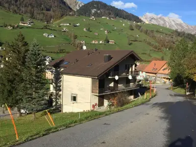 a house on the side of a road at Apartment Terrasse & Pistenähe by Interhome in Alt Sankt Johann