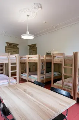 a room with a bunch of bunk beds at Kreuzlingen Youth Hostel in Kreuzlingen