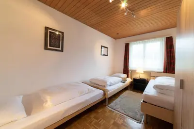 a bedroom with two beds and a window at Jambo Pua in Alt Sankt Johann