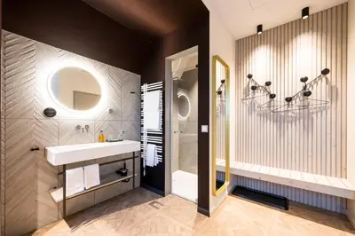 a bathroom with a sink and a shower at Klein Rigi in Schönenberg