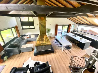 an overhead view of a living room with a fireplace at Ski-InOut 4BR Alpen Chalet, Views & Fire in Alt Sankt Johann