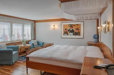 a bedroom with a bed in a attic at Hotel Säntis in Appenzell