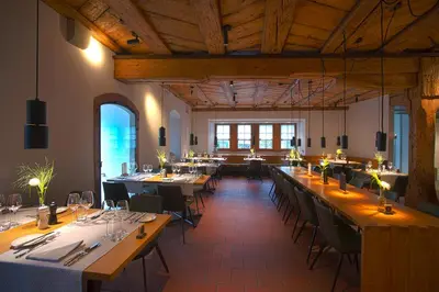 a large dining room with tables and chairs at Gasthaus zum Trauben in Weinfelden