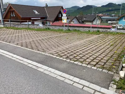 a brick road next to a train station at BNB Claudia in Appenzell