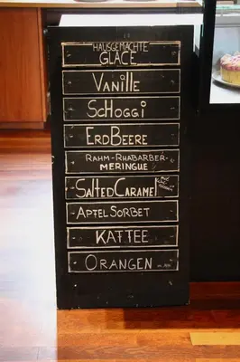 a chalkboard sign with a bunch of writing on it at Militärkantine St. Gallen in St. Gallen