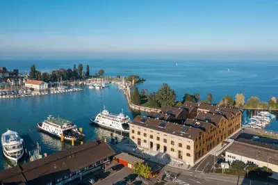 an aerial view of a harbor with boats in the water at Business Appartement 1 am Bodensee in Romanshorn